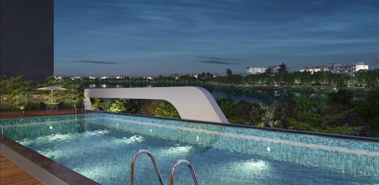 Swimming pool with Chokkanahalli Lake view at L&T Thanisandra Bangalore